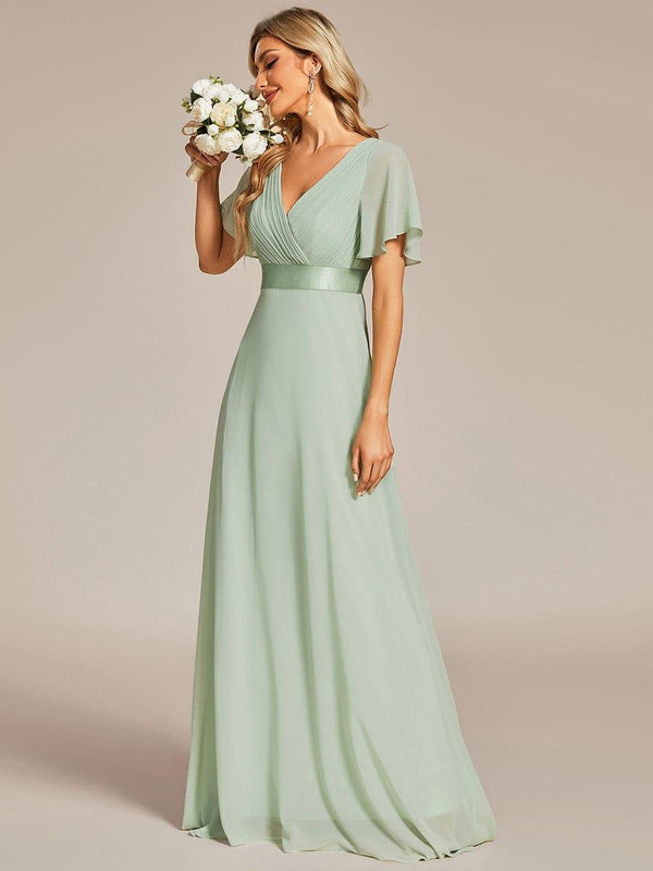The Monica Flutter Sleeve Empire Waist Dress